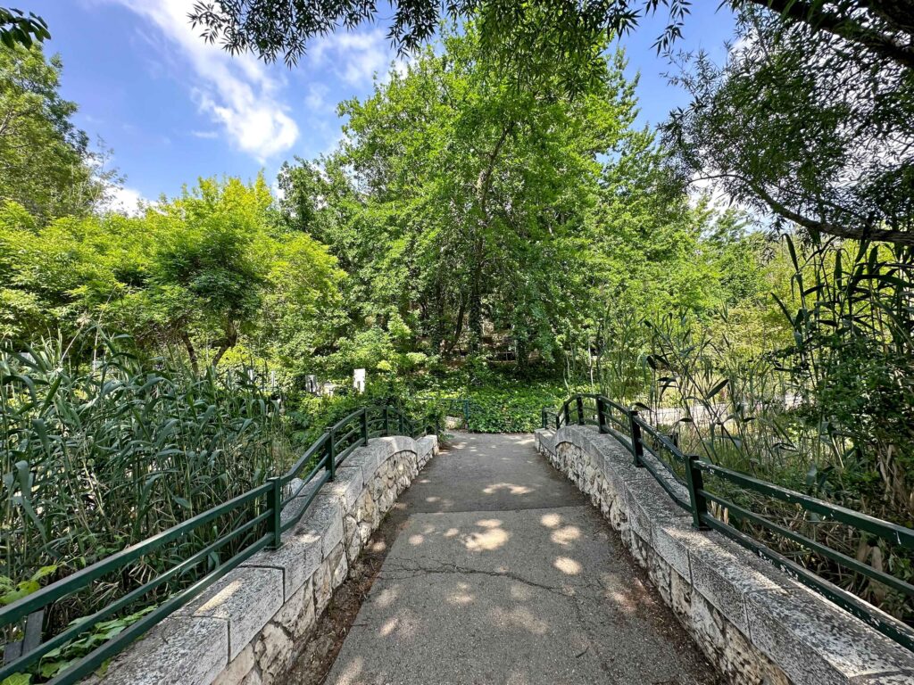 Stone bridge across the canal in the Jerusalem Botanical Garden